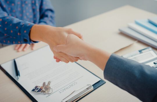General Sales Agent signing contract to represent travel company in new market