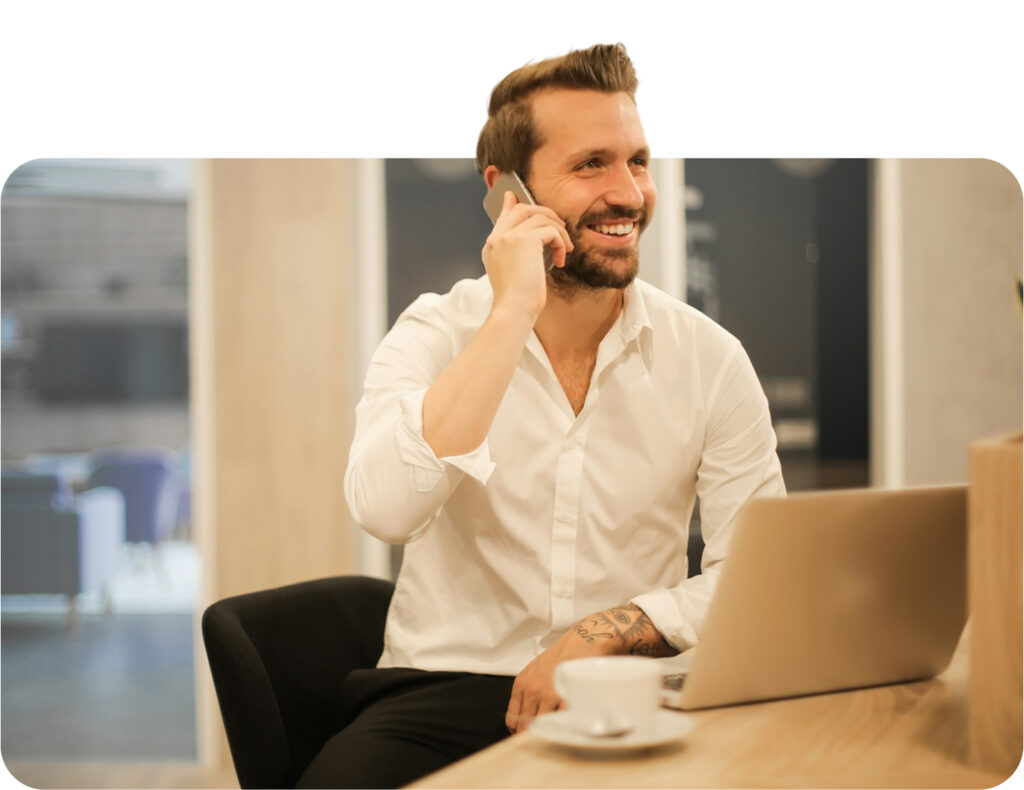 Image of man at desk | Traveltek